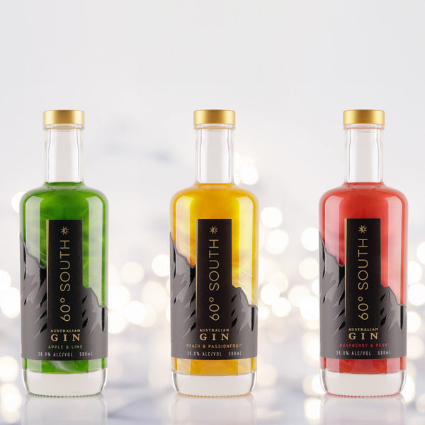 Bottles of 60º South Glitter Gin - Apple & lime, Peach & Passionfruit and Raspberry & Pear