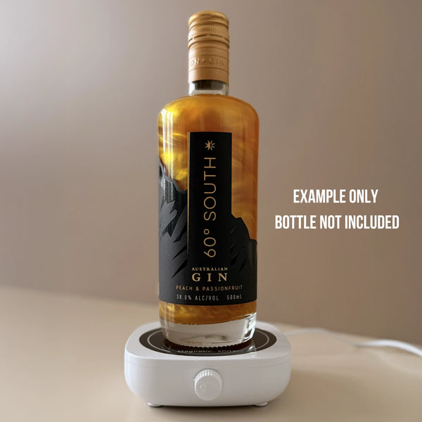 Bottle of 60 South Australian Gin on a magnetic stirrer with a neutral background