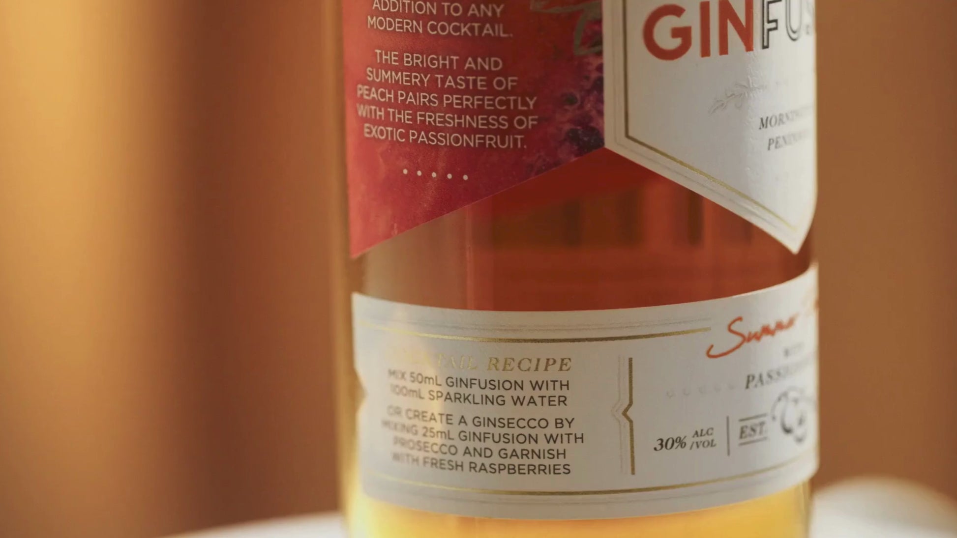 Video showcasing an easy-to-make cocktail with Original Spirit Co.'s Peach & Passionfruit GinFusion, highlighting its vibrant colour and refreshing taste.