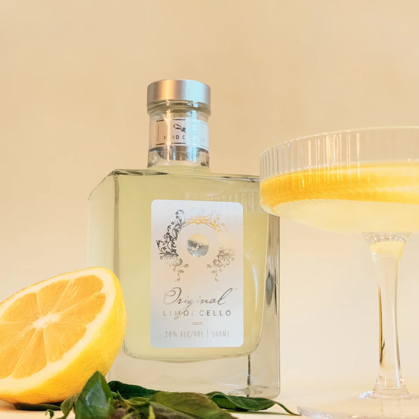 Australian Limoncello cocktail with Original Spirit Co. bottle. Freshly cut lemon grown on Mornington Peninsula.