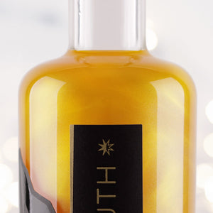 Close up of Peach & Passionfruit 60º South Glitter Gin 