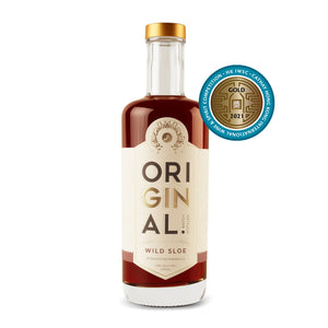 Bottle of Original Wild Sloe Gin with a white studio background and a Gold Medal from the Cathay Hong Kong International Wine & Spirit Competition